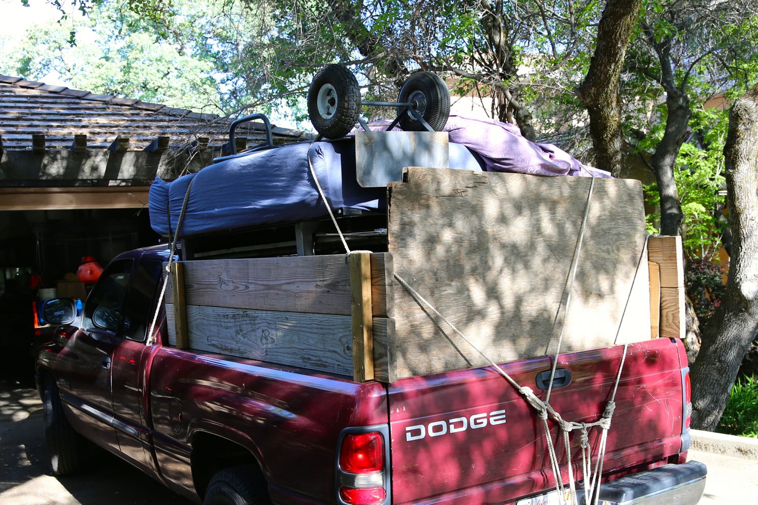 Our worldly possessions piled high in a moving truck as we move out of our apartment and into a van.