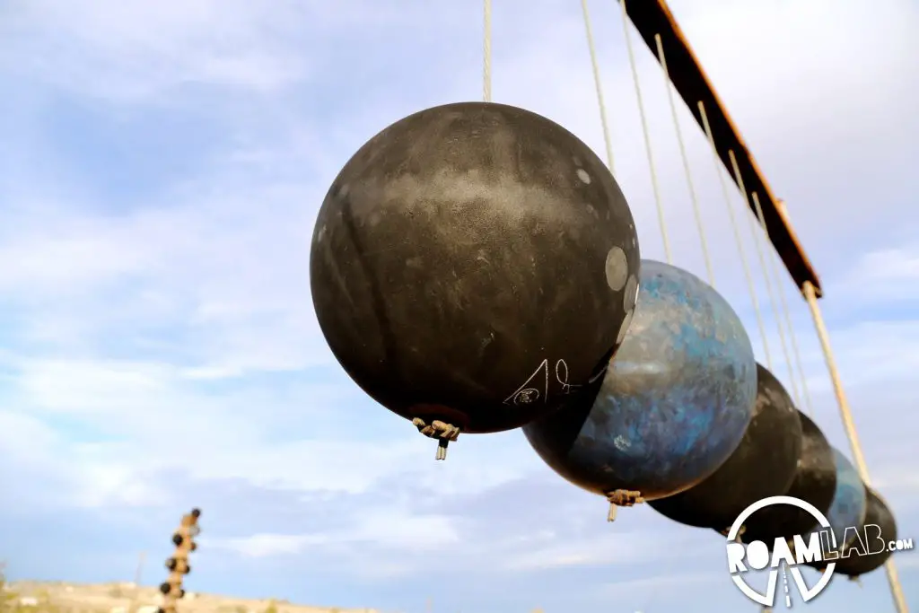 Suspended bowling balls