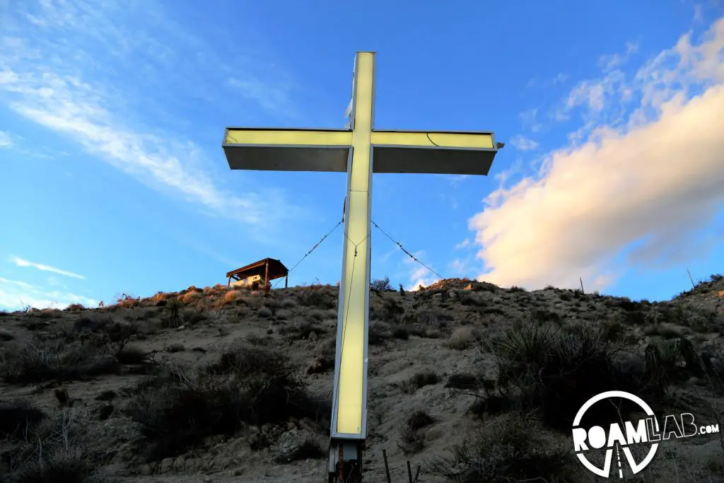 A neon cross, as is right and correct in the California desert.