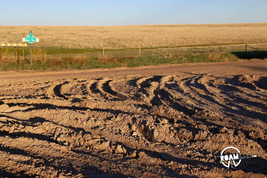 While we saw a van at the rocks, I do question how it managed to traverse the dirt road there. Not only had recent rains given the road the consistency of playdough, but the rolling hills made navigating the deep ruts left by previous cars particularly perilous. 