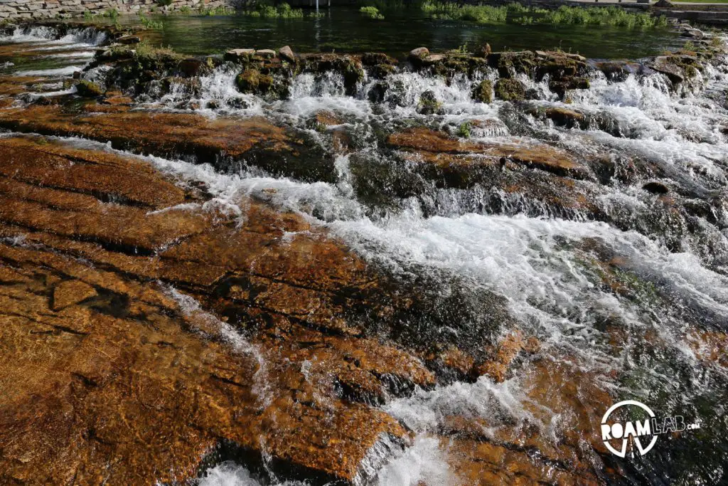 Water overflows from Giant Springs into the Missouri River.
