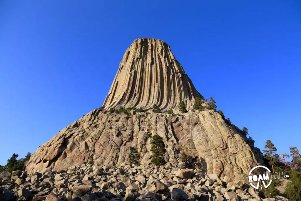The Devil's Tower looks over a path that tightly circles the base.