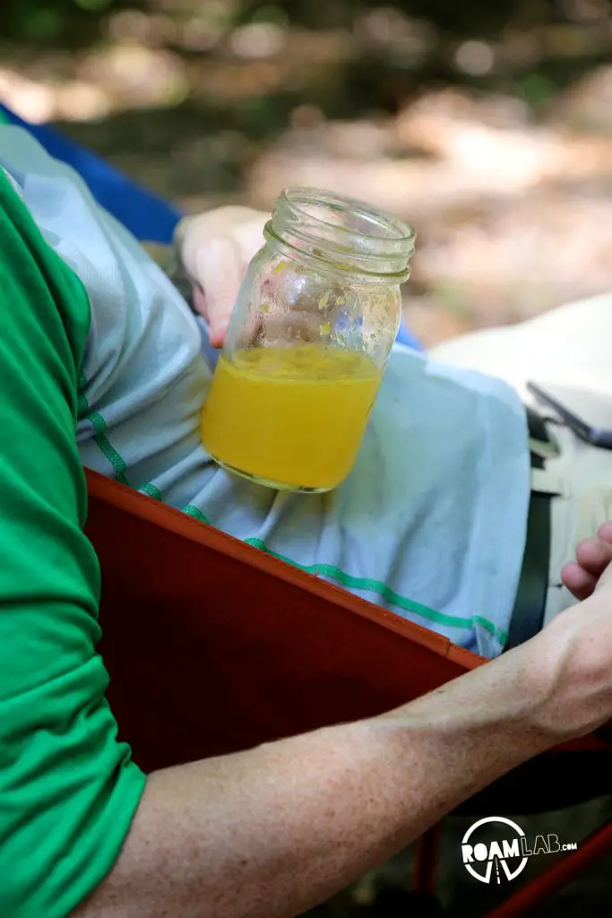 Relaxing with a mimosa while waiting for the Big Boys & Girls Boozy Campground Orange Sticky Rolls to bake.