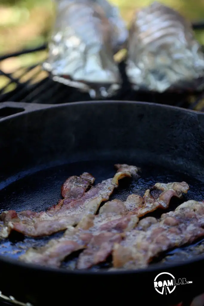 Stoke up that fire for an amazingly delicious Hiker's Bacon And Egg Potato Boat Breakfast
