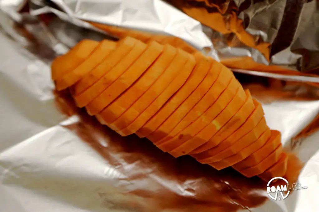 Thinly sliced sweet potato, all the faster to cook with! Getting those veggies in with some roasted sweet potato and kale.