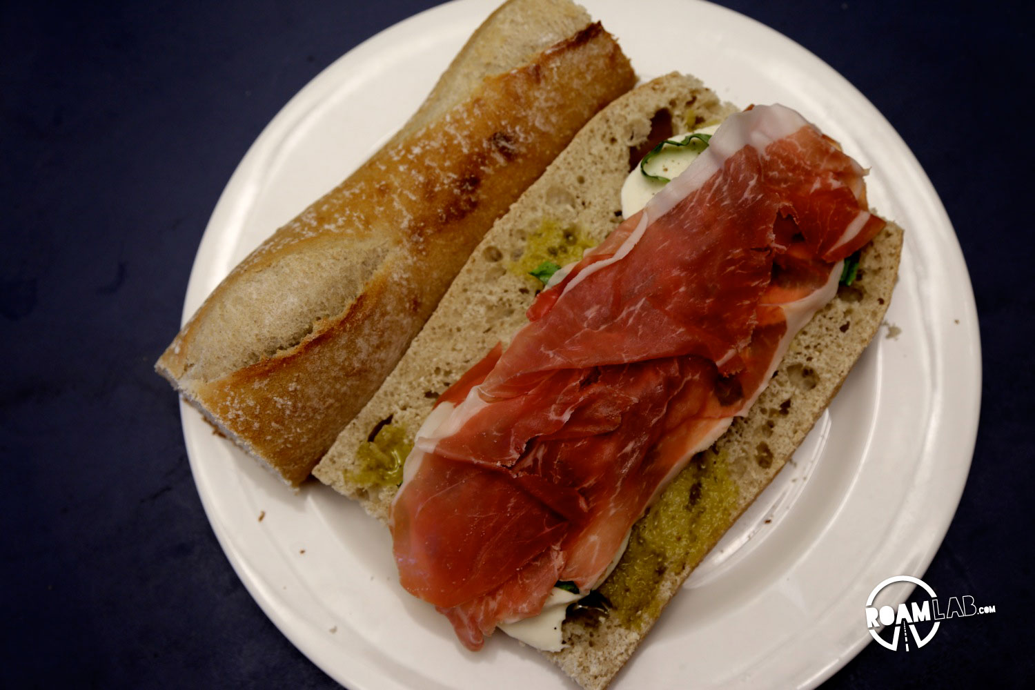 Topped off with prosciutto. The making of a delicious Class in the Campground Prosciutto Mozzarella Sandwich.