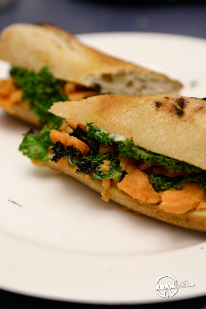 A vegetarian-friendly sandwich for the campfire: Grilled Sweet Potato, Kale, & Goat Cheese Baguette