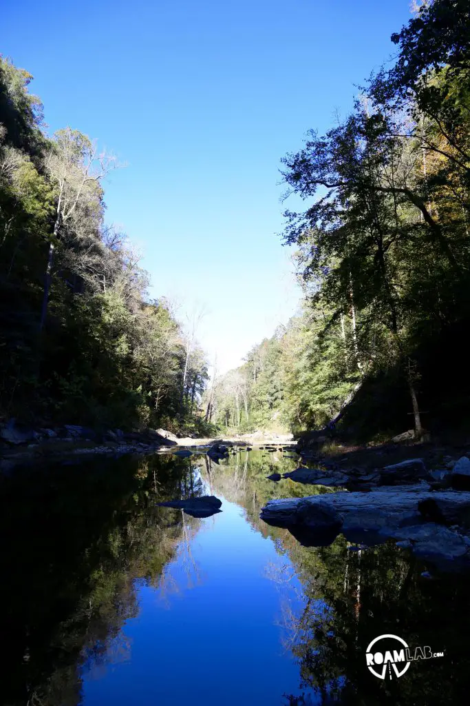 Cummins Falls State Park is located halfway between Nashville and Knoxville, Tennessee.  That makes it the ideal getaway for both cities in wanting a some a hike, a waterfall,  and an amazing water hole all in one place.