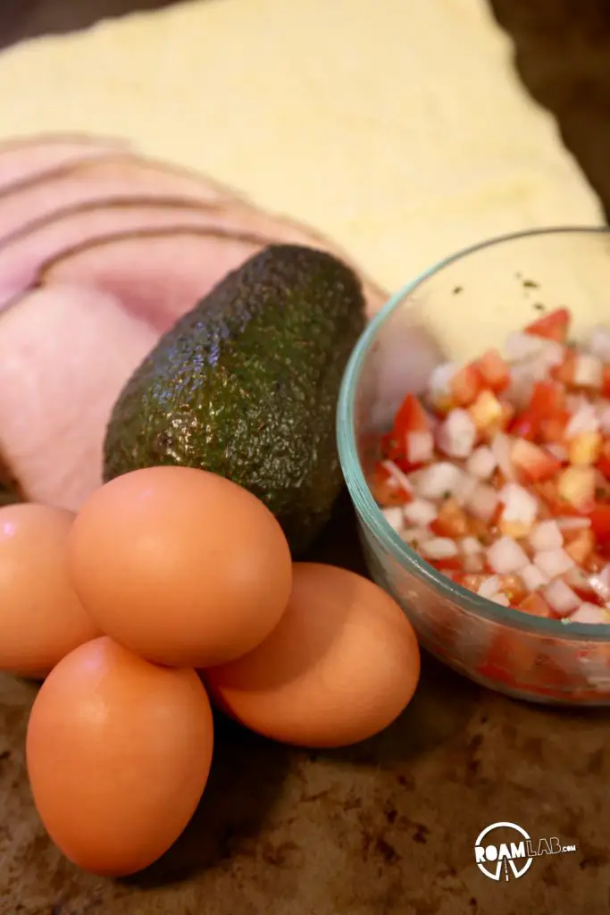 When you have some left over breakfast ingredients and crescent roll pastry, it's time to through it all together to make a Southwest Baked Egg Breakfast Pastry.