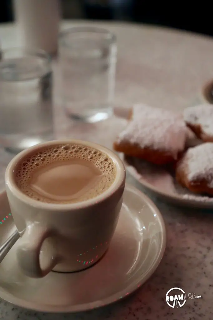Relaxing at Cafe Du Monde for some cafe' au lait, beignets, and people watching.