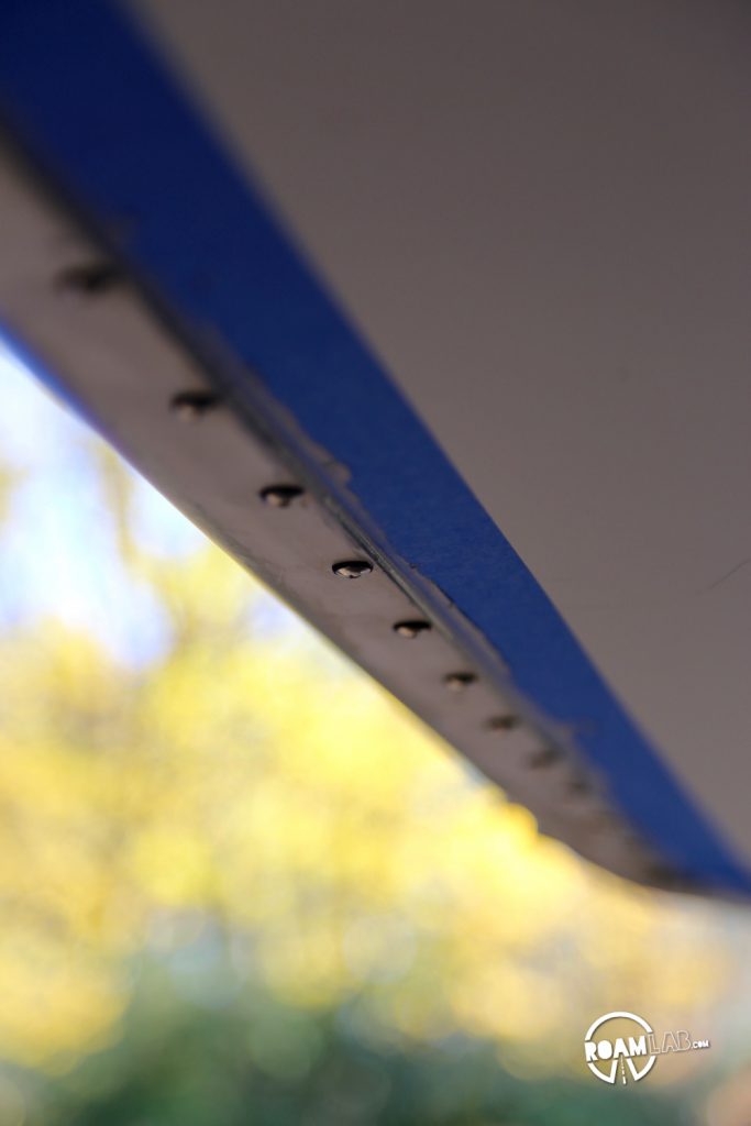 Sure, we could have just screwed the wings in, but that would have left out one, ever-present concern: leakage.  That is why we not only screwed the wing to the camper channel but also used Sika, a common sealant for aluminum campers.