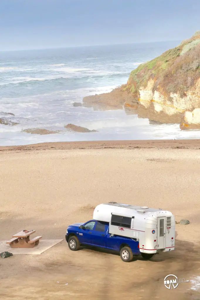 Avion Ultra C11 truck camper down on the beach in Montaña de Oro State Park