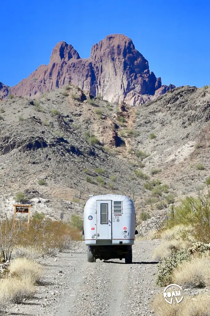 Returning from the King of Arizona Mine. See the sign on to the left of Dodgy? That marks the beginning of private property and our strange chase scene.