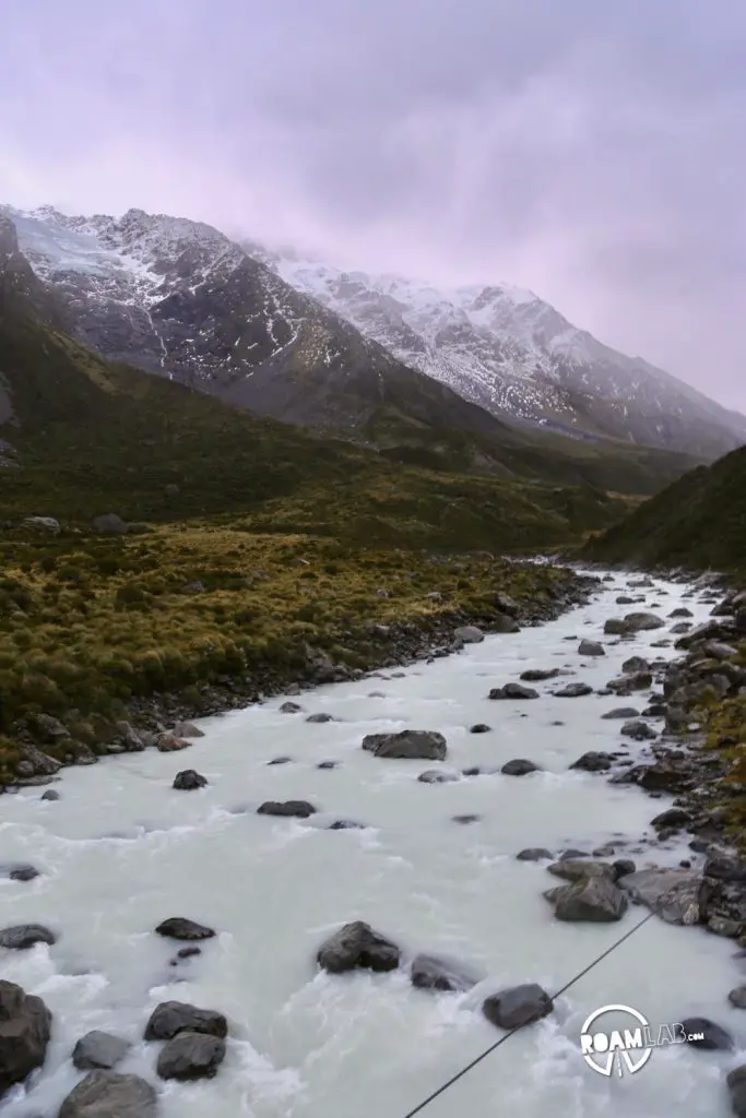 Contending against gale force winds to see a glacier on the Hooker's Valley Track along the Southern Alps in Aoraki/Mount Cook National Park.