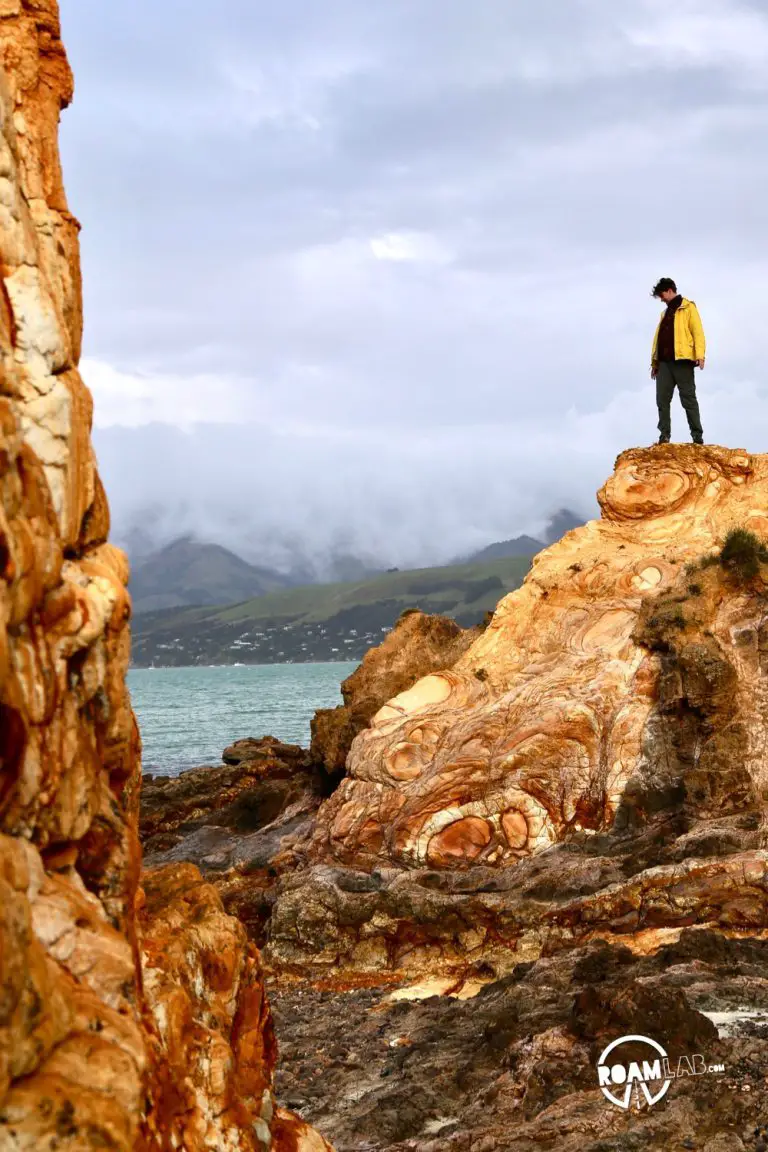 Driving to Christchurch to tramp (hike) the Onawe Track along the Onawe Peninsula between Barrys Bay and Duvauchelle Bay on New Zealand's South Island.