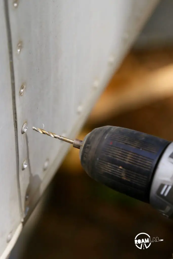 Learn our 3-step rivet removal process for buck rivets on vintage campers - optimizing speed of rivet removal while minimizing damage to the aluminum sheet.