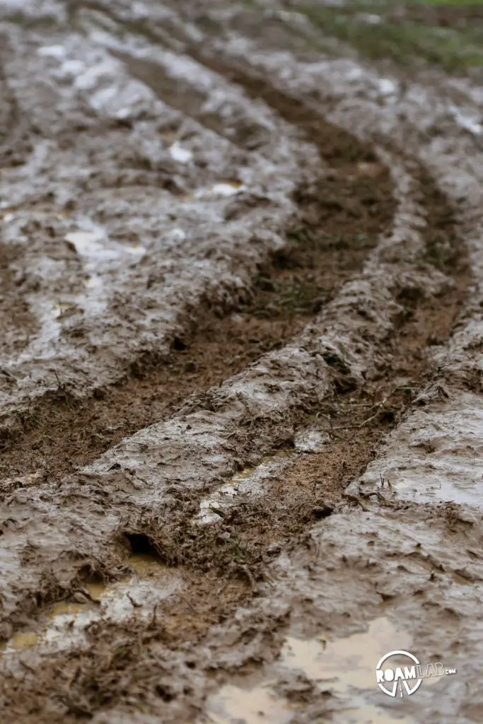 Muddy tire tracks at the Overland Expo East 2018