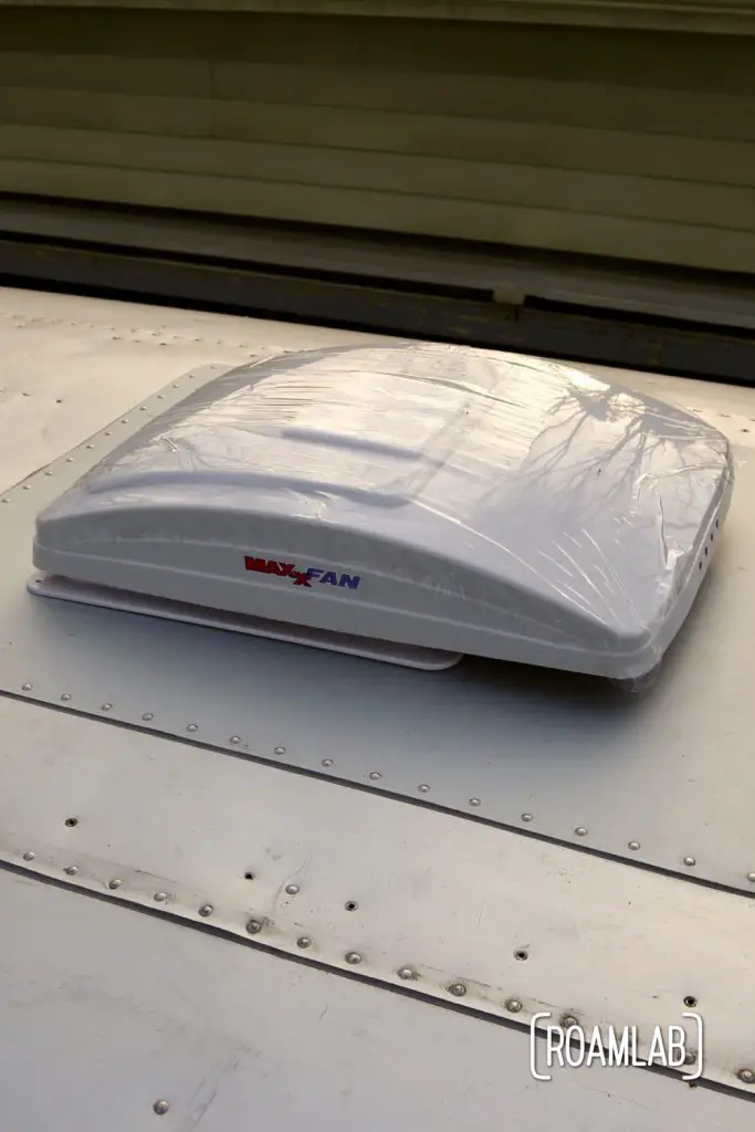 The new fan blends in well with the anodized aluminum for a DIY MaxxAir Fan installation.