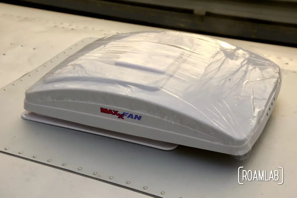 The new fan blends in well with the anodized aluminum for a DIY MaxxAir Fan installation.