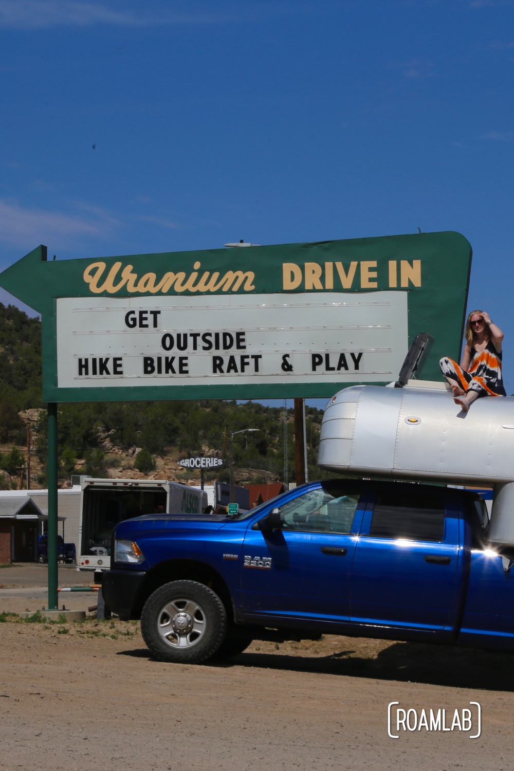 Hanging out by a reclaimed drive-through sign in Nucla, Colorado.