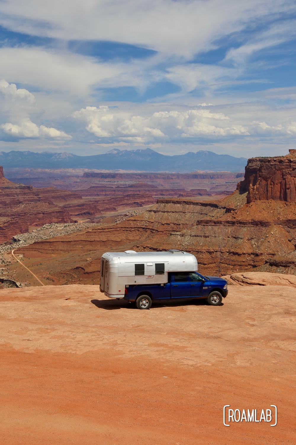 1970 Avion C11 truck camper parked on overlook in Canyonlands National Park