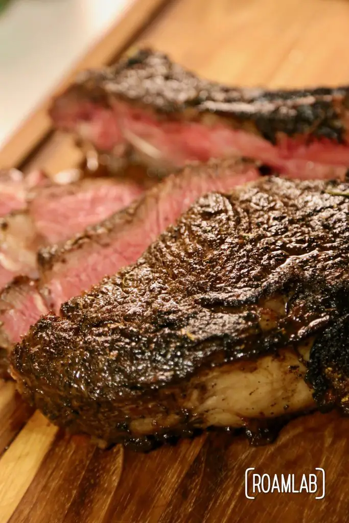 Grilling tomahawk steak over and open campfire is a challenging and delicious undertaking.