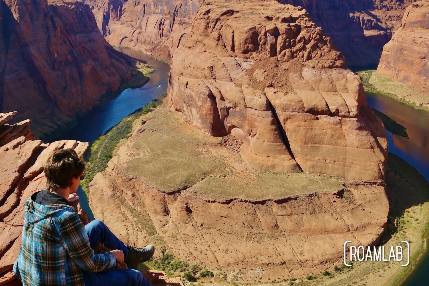 Sitting on the edge of Horseshoe Bend