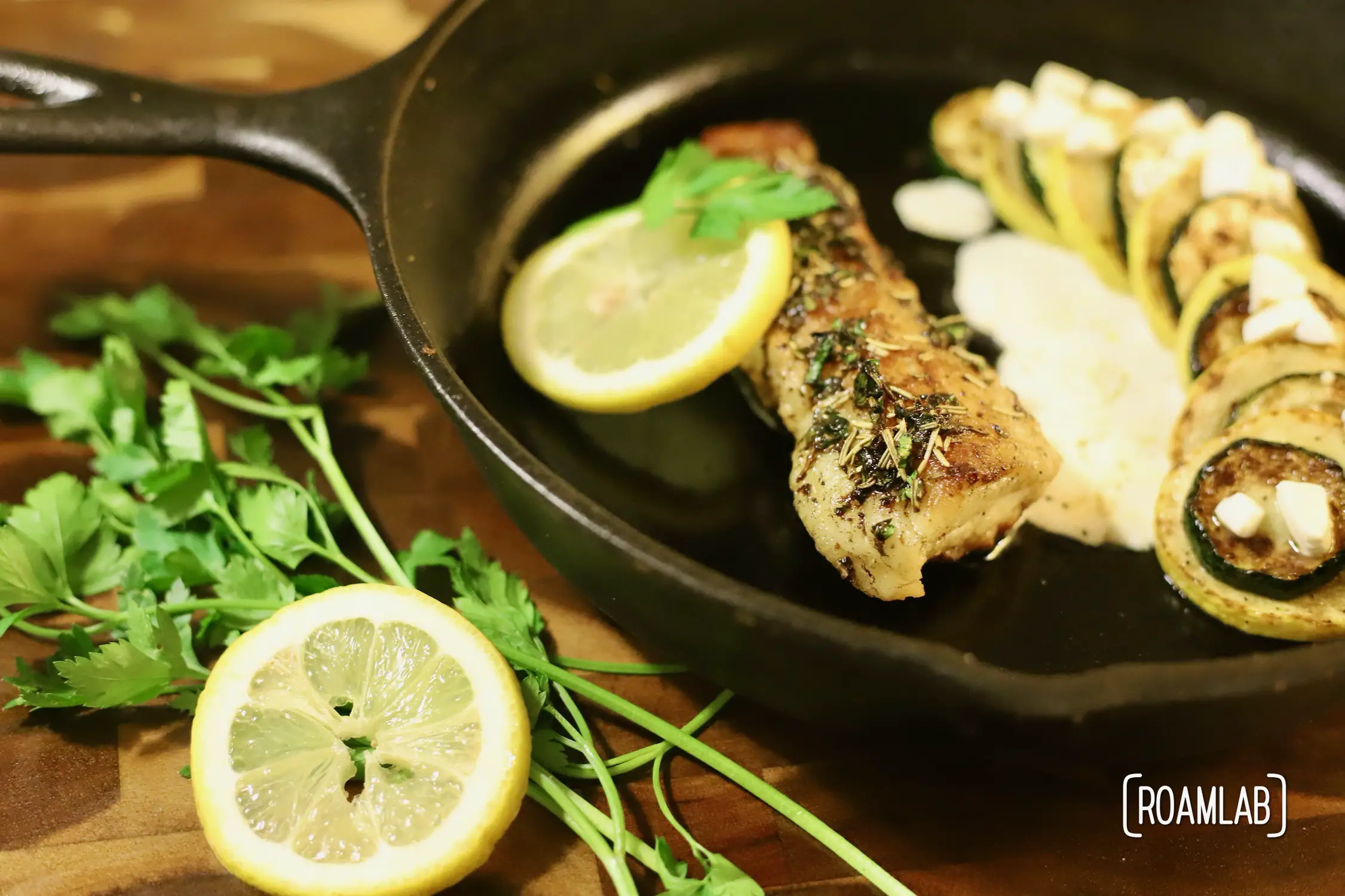 Take your seafood cuisine to the next level with this cast iron skillet seared sea bass in a herb butter sauce campfire cooking dinner recipe