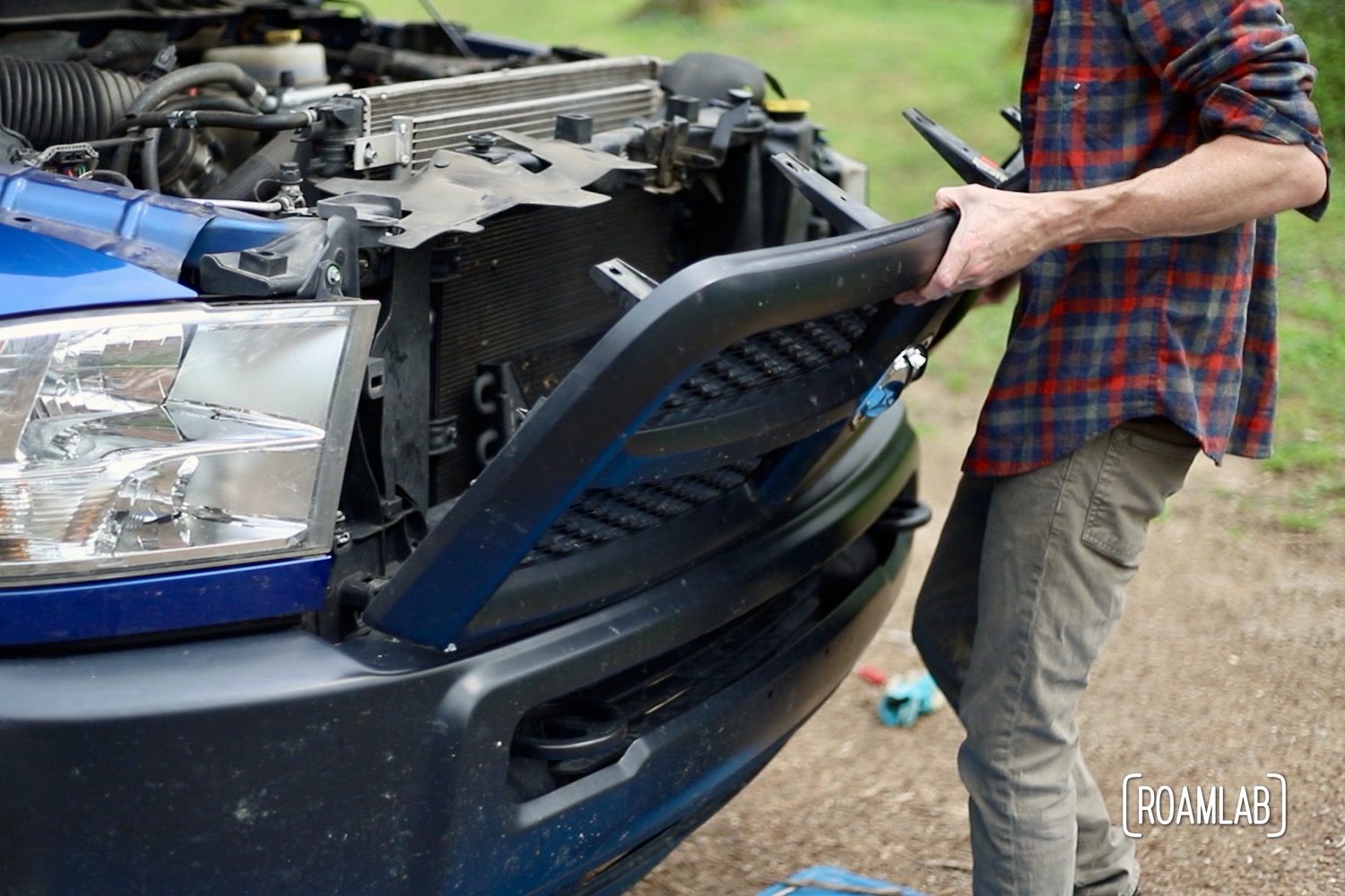 We step into the roll of DIY automotive mechanics as we remove the grille on our 2015 Ram 3500 Tradesman truck to expose the front bumper.