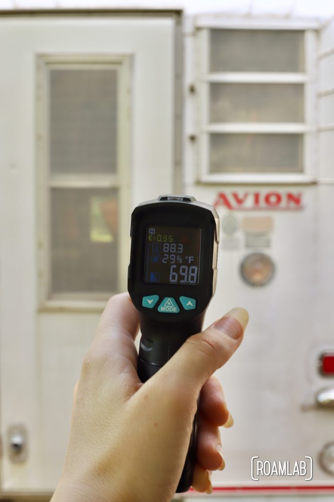 temperature gun aimed at avion truck camper