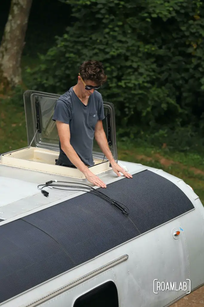 Test fitting solar panels on a 1970 Avion C11 truck camper roof.