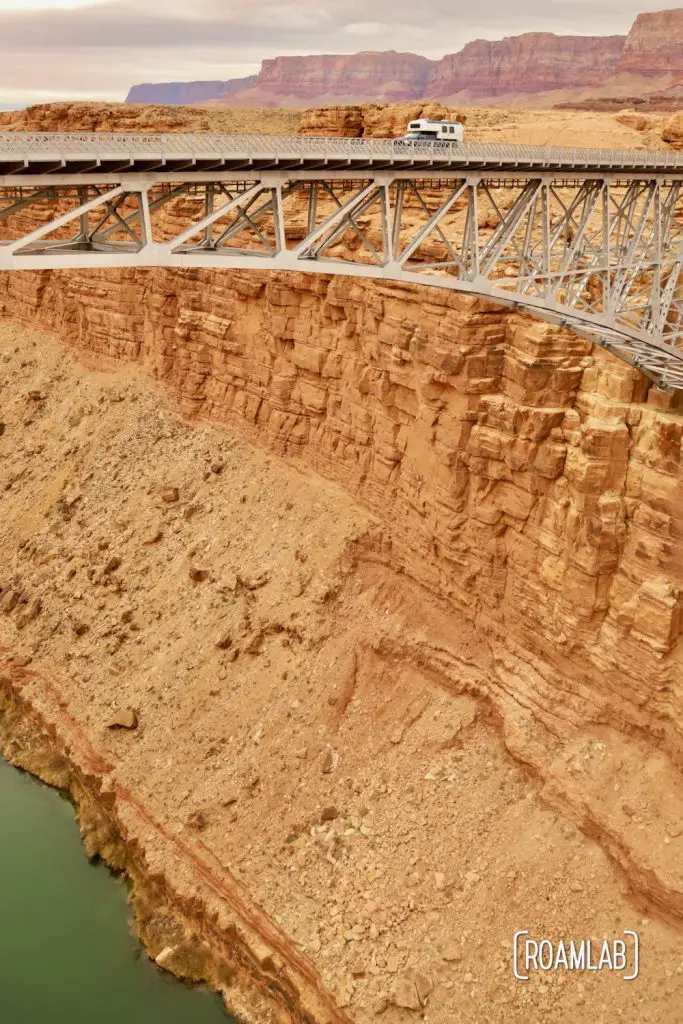 1970 Avion C11 truck campe crossing the Colorado River at Marble Canyon on the Navajo Bridge.