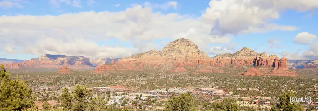 View of Sedona, Arizona from Airport Mesa with red buttes in the distance.