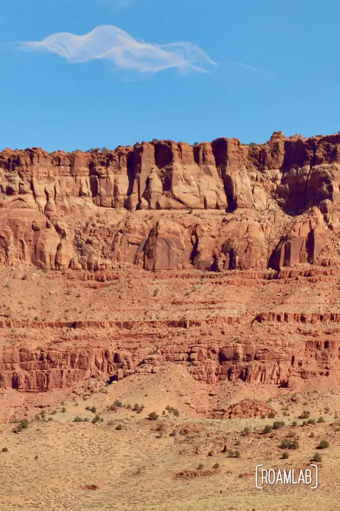 Sunsoaked Vermillion Cliffs with a brilliant blue skie.
