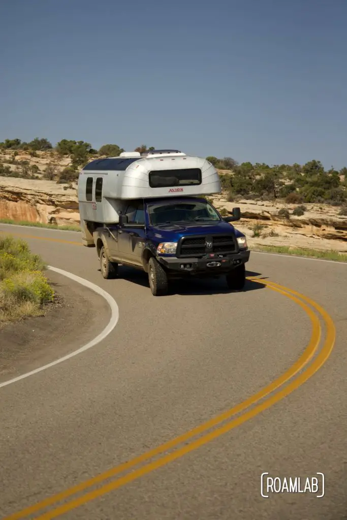 Vintage 1970 Avion C11 truck camper on Rimrock Driver in Colorado National Monument.