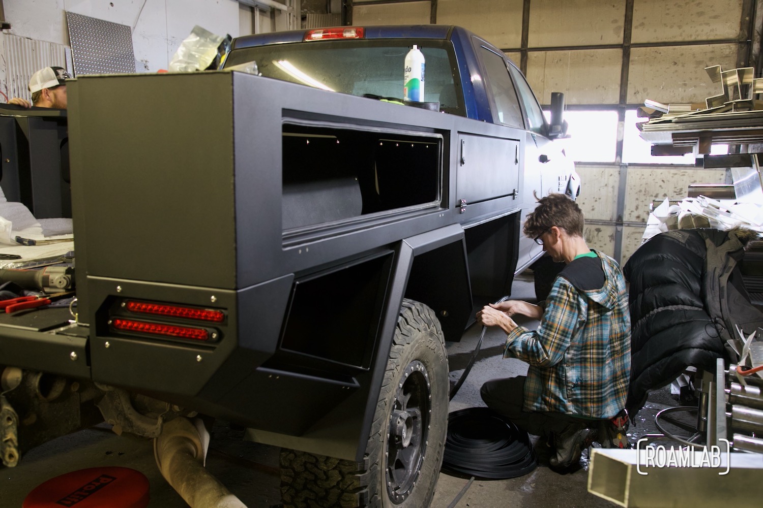 Installing door seal for storage boxes on a Bowen Customs aluminum truck bed.