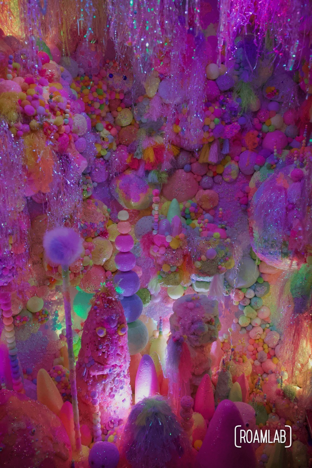 A colorful display that both looks like candy, smells like candy, but is not candy at the House of Eternal Return, Meow Wolf's Santa Fe, New Mexico Location