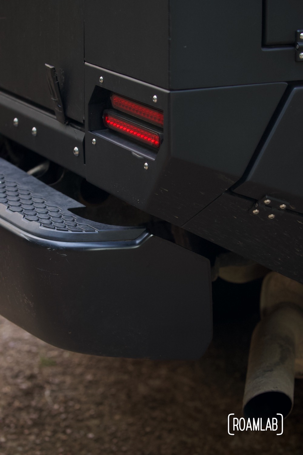 Side view of a truck bumper mounted on to a custom truck bed.