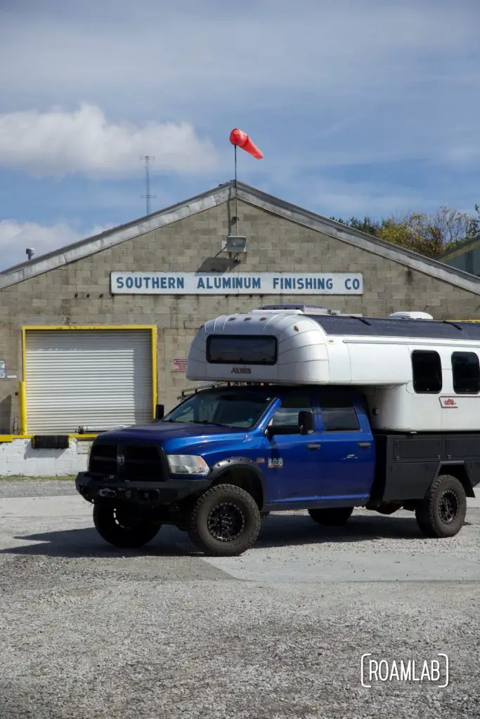 1970 Avion C11 truck camper parked outside the Southern Aluminum Finishing Co warehouse.