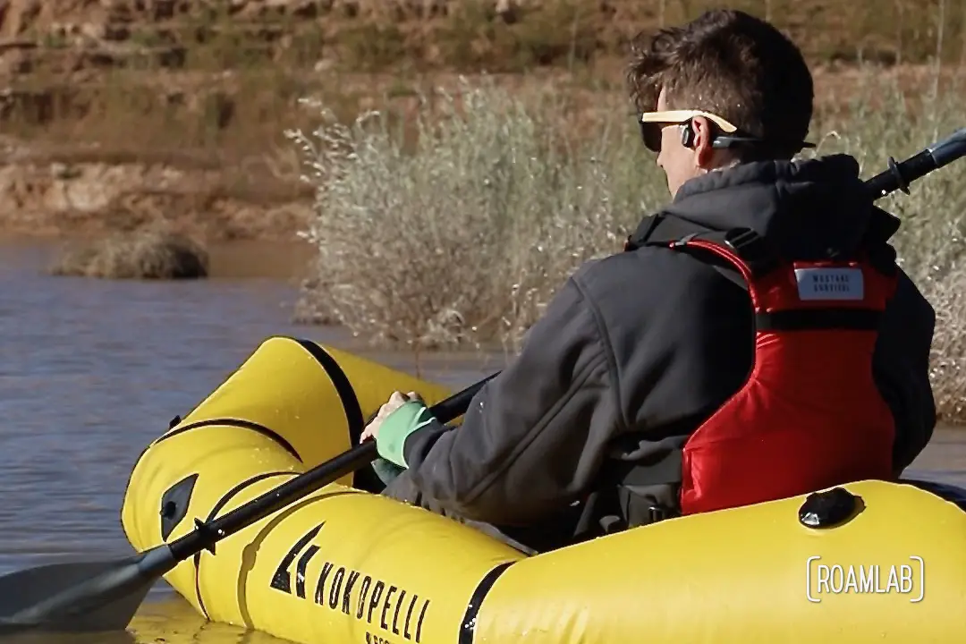 Man paddling in a yellow raft on Lake Mead.