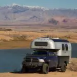 Avion C11 truck camper parked along a cliff by Lake Mead, Nevada.