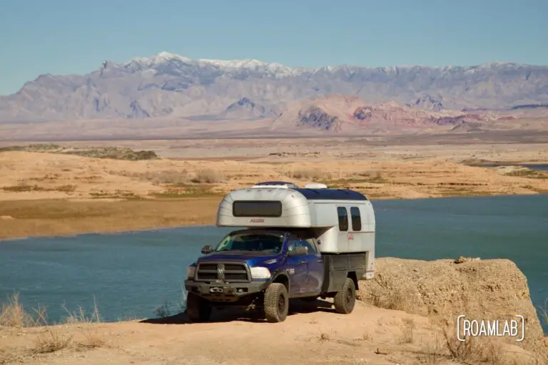 Avion C11 truck camper parked along a cliff by Lake Mead, Nevada.