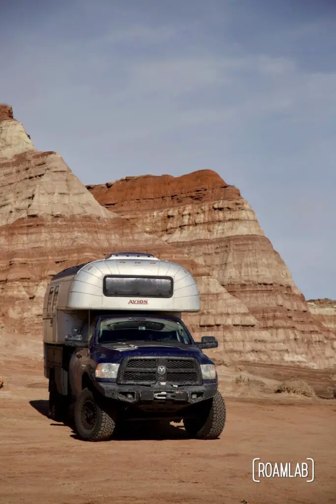 Avion C11 truck camper parked at the trailhead of Toadstool Hoodoos Trail.