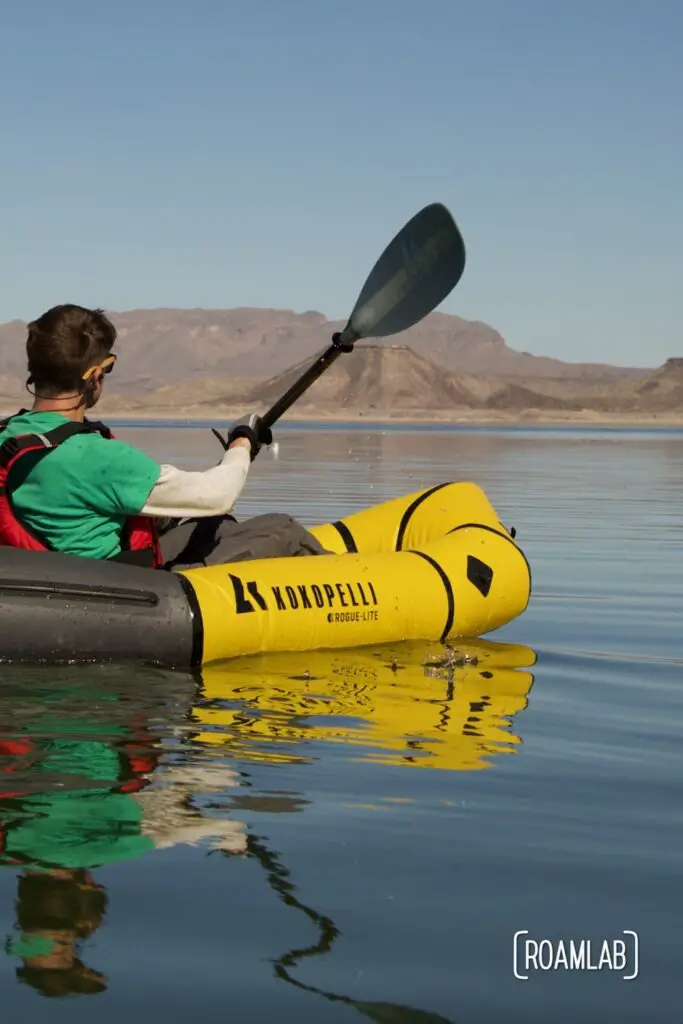 Chris paddling in his yellow Kokopelli packraft on Elephant Butte Lake State Park.