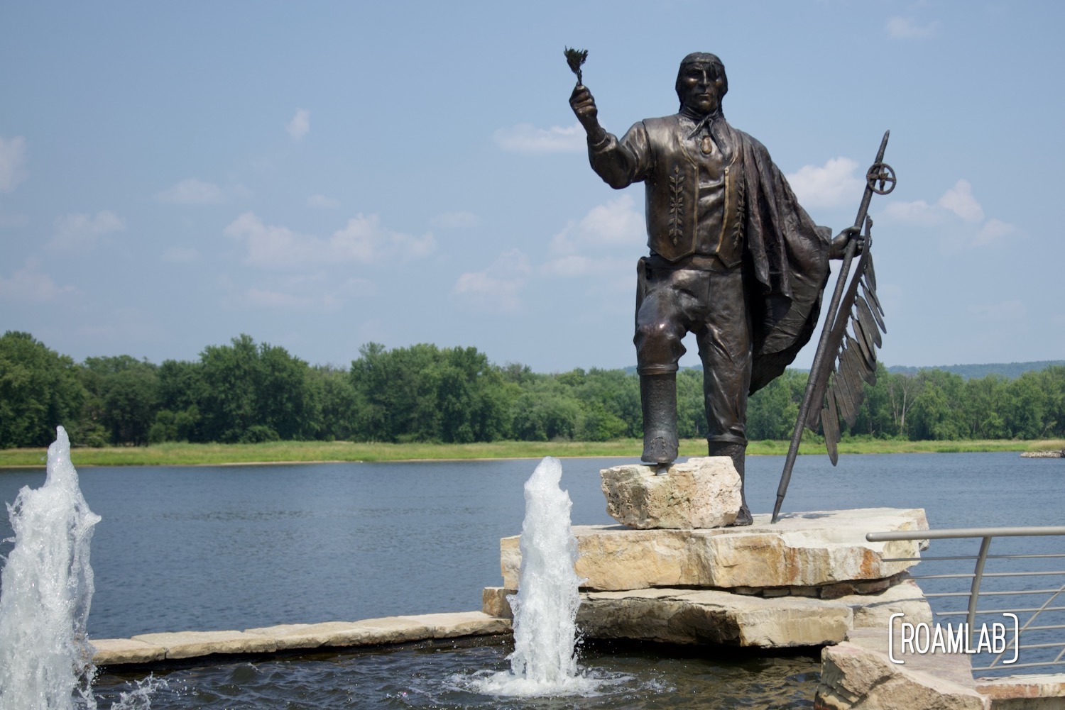 Memorial state and fountain of The Chiefs Wapahasha in front of the Mississippi River.