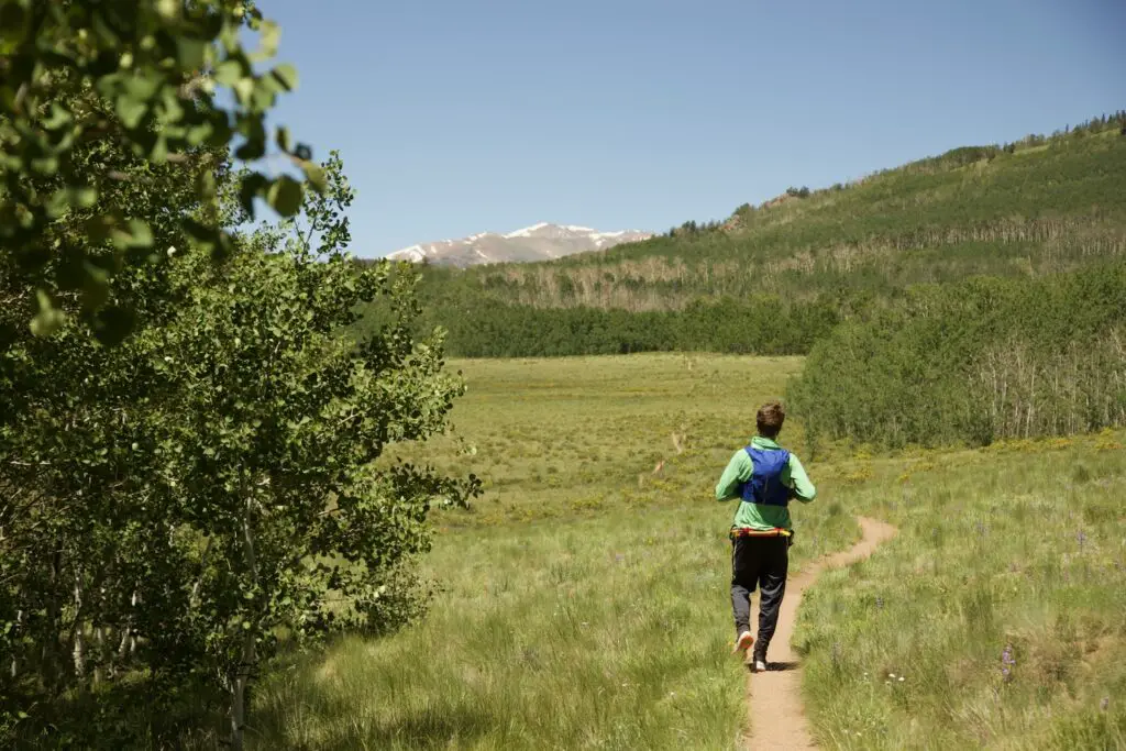 Man running along the Colorado Trail outside Como, Colorado.