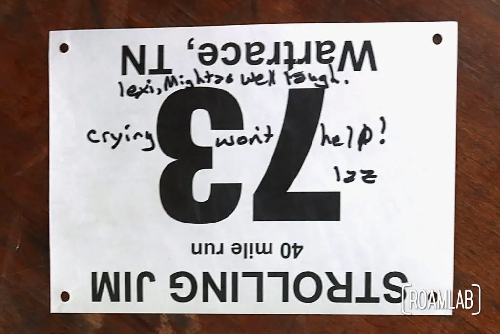 Race bib 73 signed "Lexi: Might as well laugh.
Crying won't help!
Laz"