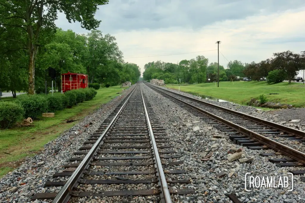 Green forested view down the train tracks from Wartrace, TN.